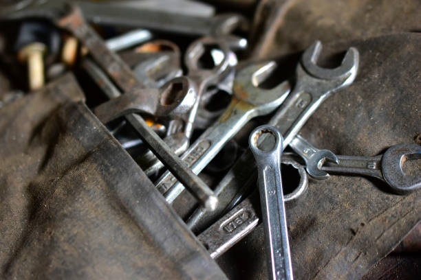 istock Rusty iron carob keys on a table in the garage 1262735119