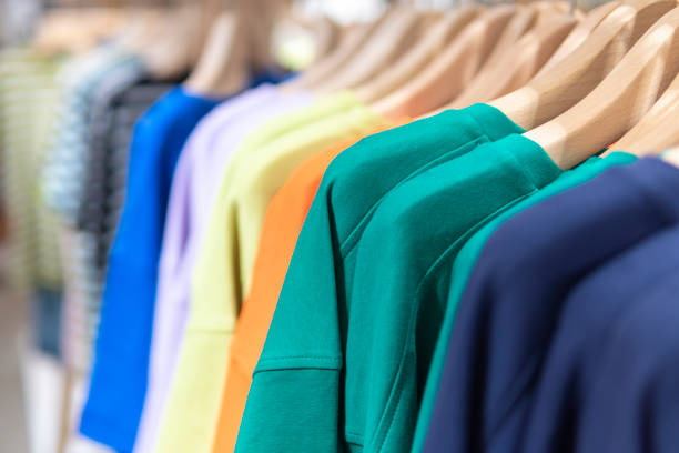 istock Colorful clothes hanging on a hanger in a store 1262736063