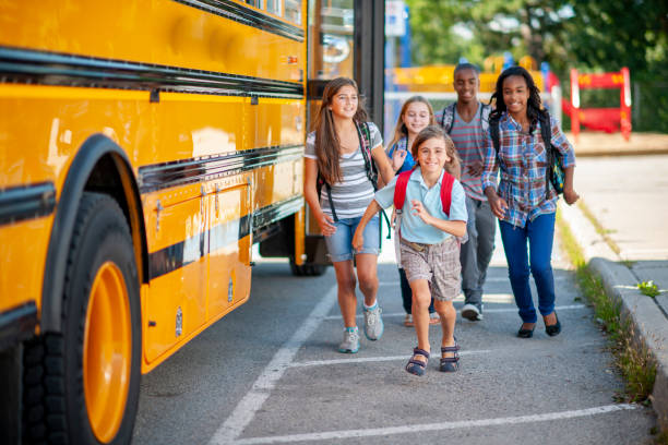 istock Young kids are back to school with the school bus 1262736767