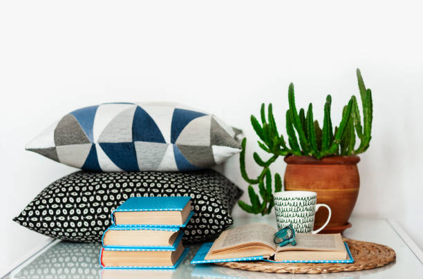 istock Cozy home interior decor: stack of books, 1262739956
