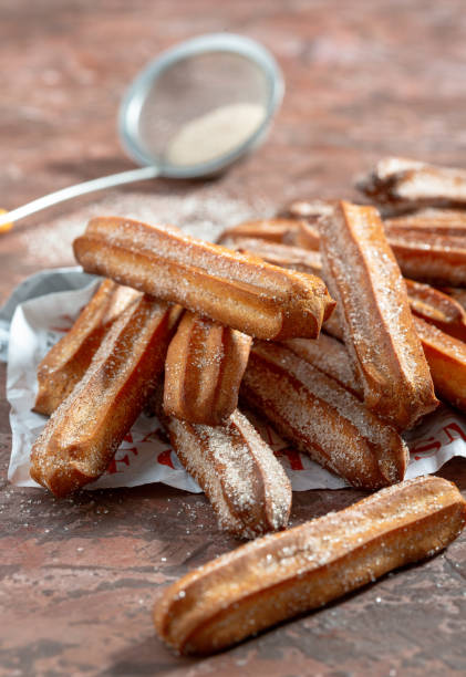 istock Traditional churros sprinkled with sugar and cinnamon. 1262740060