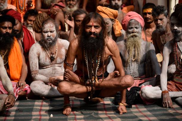 hindu holy men or monk perform yoga - sadhu imagens e fotografias de stock