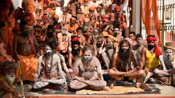 Guwahati, Assam, India. 21 June 2019. Hindu holy men or Hindu monk perform yoga during Ambubachi Mela to mark International Yoga Day at Kamakhya Temple in Guwahati. The International Day of Yoga has been celebrated annually on 21 June.