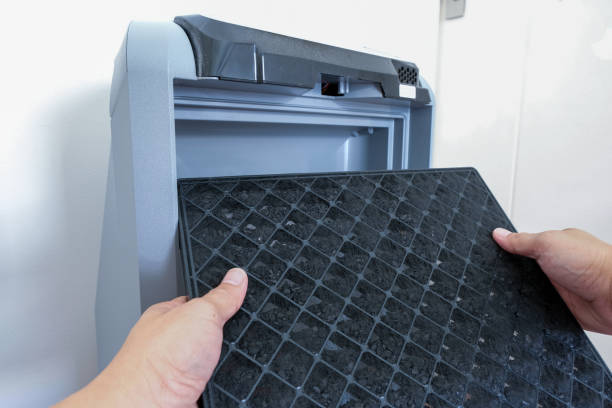 istock Air purifier. Maintenance the air filter. Replace the charcoal filter. 1262740475