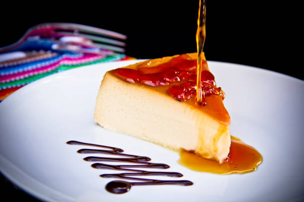 istock Creme caramel slice and syrup splash 1262746241