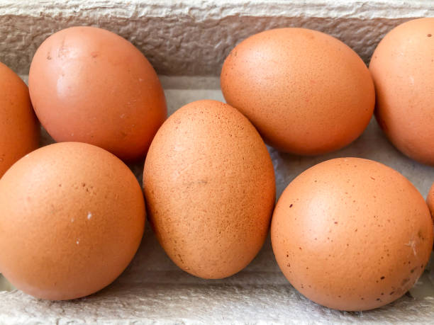istock natural eggs on a cartoon box at market 1262747044