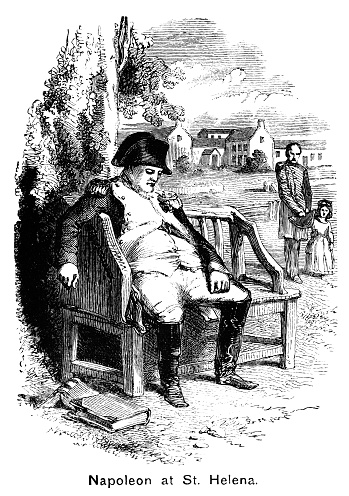 Napoleon Bonaparte dozing on a bench under a tree on the island of St Helena where he was held prisoner following his surrender at the Battle of Waterloo in 1815. One of his guards, possibly the island’s Governor, Sir Hudson Lowe, is looking on, with Longwood House - Bonaparte’s home on the island - in the background. Bonaparte died on St Helena in 1821 and was buried on the island; his body was repatriated to Paris in 1840. From “The Cottager and Artisan: The People’s Own Paper” published in 1898 by The Religious Tract Society, London.