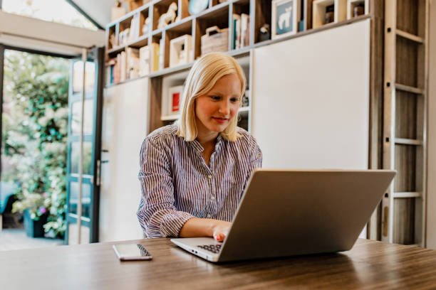 istock Young woman working on the laptop 1262751342