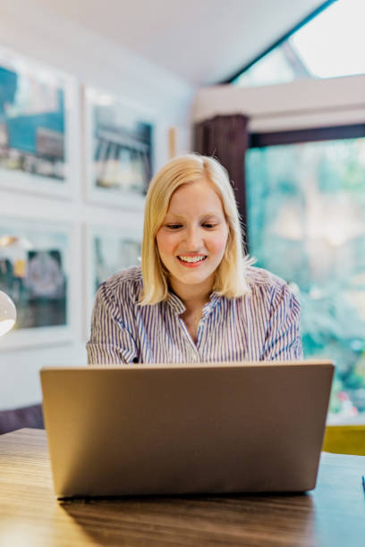 istock Young woman working from home 1262751360