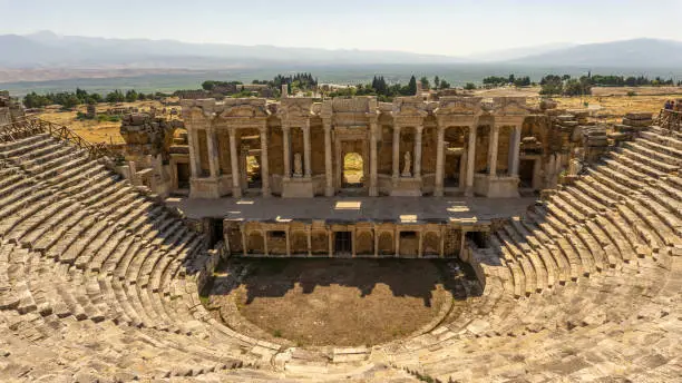 Photo of the majestic roman amphitheater in hierapolis, summer