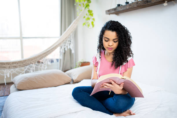 istock Woman reading the bible 1262760631