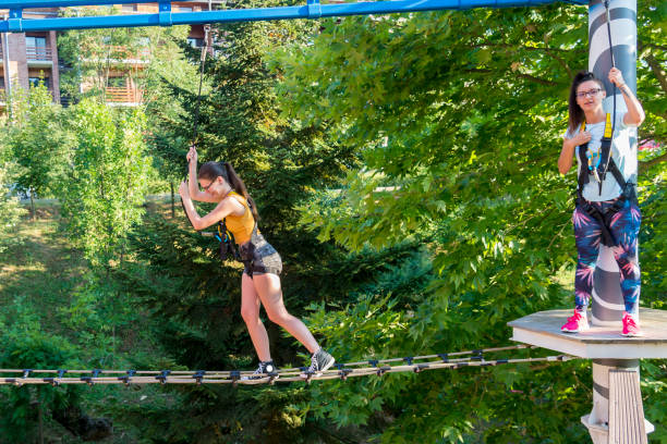 istock Carefully on the rope adventure park 1262762833
