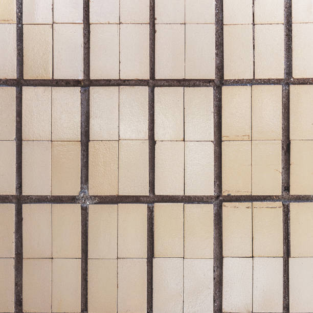 istock Abstract ceramic tile, weathered with cracks and scratches. Landscape style. Surface roughness. Great background or texture. 1262763450