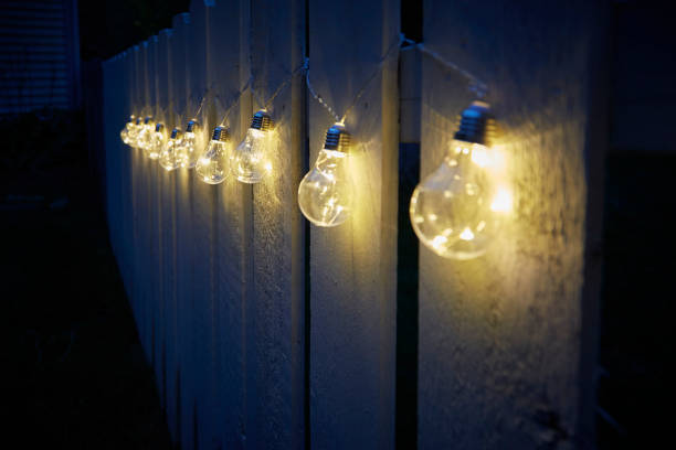 istock Lights hanging on a fence. 1262764894