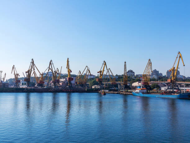 istock Odessa, Ukraine - August 15, 2016: Container cranes in cargo port terminal, cargo cranes without job in an empty harbor port. A crisis. Defaulted paralyzed entire economy in Odessa, Ukraine, August 15, 2016 1262765859