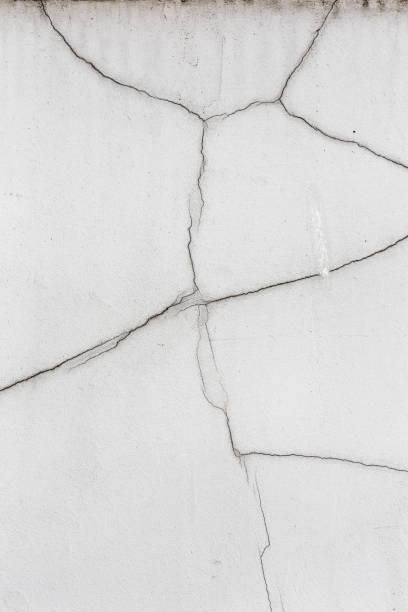 istock Abstract concrete, weathered with cracks and scratches. Landscape style. Grungy Concrete Surface. Great background or texture. 1262767207