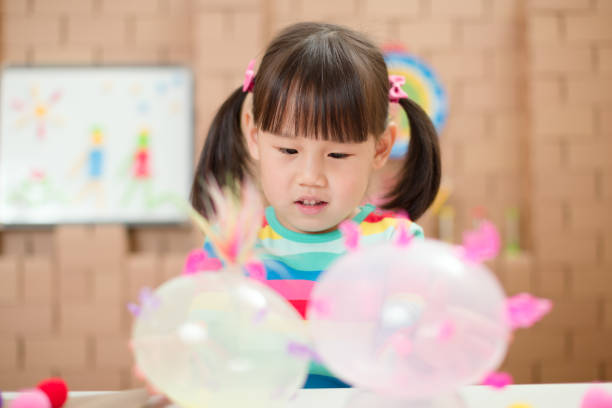 istock young girl making craft for home schooling 1262792411