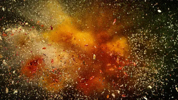 Freeze motion of various spice explosion, abstract culinary background