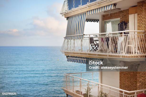 Modern Brick House Balcony Closeup Panoramic View Of The Mediterranean Sea Alicante Spain Vacations Travel Destinations Cruise Recreation Hotel Resort Real Estate Development Themes Stock Photo - Download Image Now