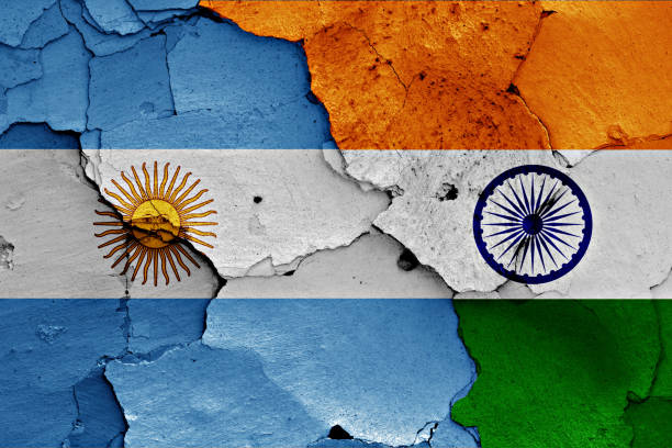 istock flags of Argentina and India painted on cracked wall 1262803709