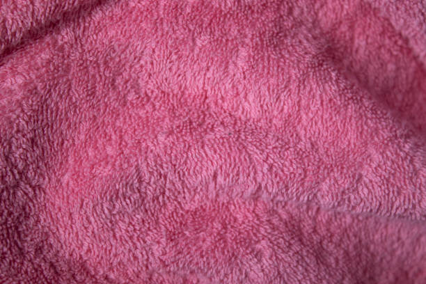 istock pink fabric, terry, textured background. suitable for design paper, background text, images, billboards, pamphlets 1262813485