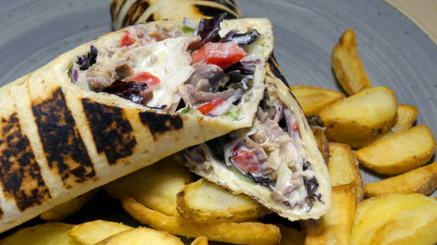 istock Wrapped sandwich with ham, cheese and vegetables 1262813678