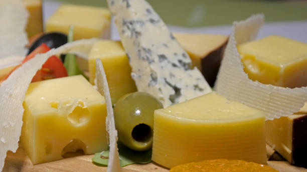 istock Cheese plate with olives and dry fruit 1262813694