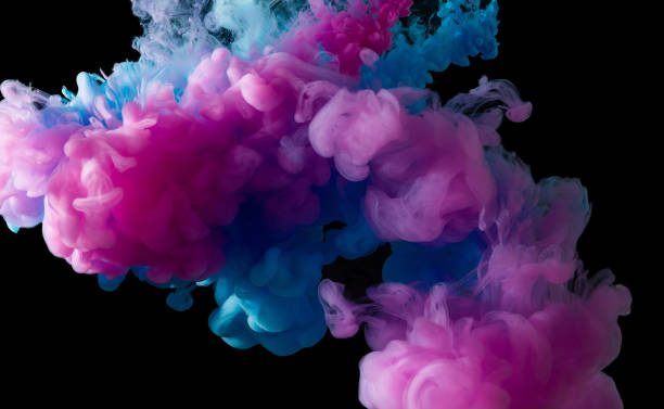 istock Colorful paint smoke on abstract black background 1262816752