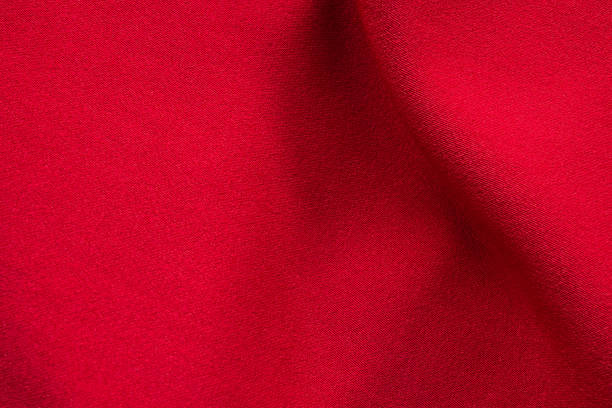 istock Red fabric cloth texture background close up 1262816797