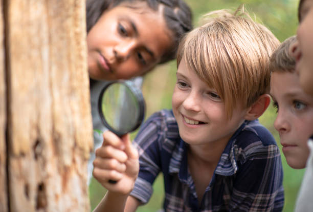 istock Kids spot something exciting in the forest 1262816898