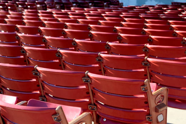 istock Empty raws of red chairs outside. Covid-19 quarantine 1262826191