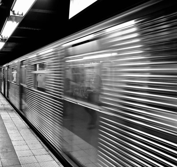 istock NYC subway station train in motion Black and white 1262832052