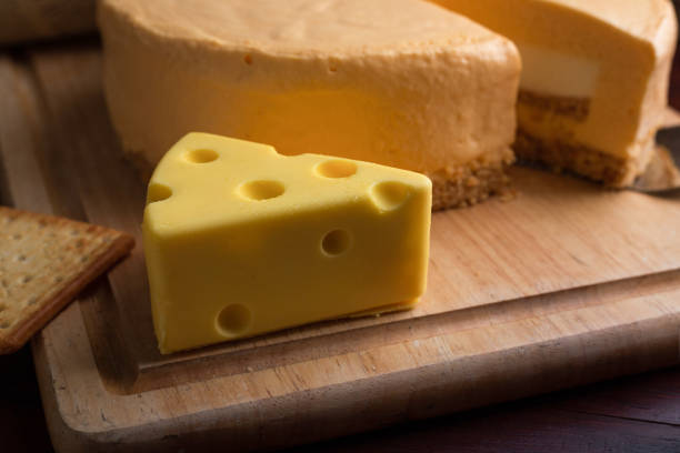 istock Close up cheese cake on wooden table. 1262835677