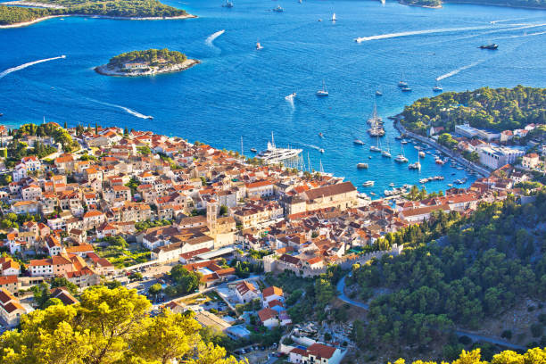 istock Hvar bay and yachting harbor aerial panoramic view 1262835771