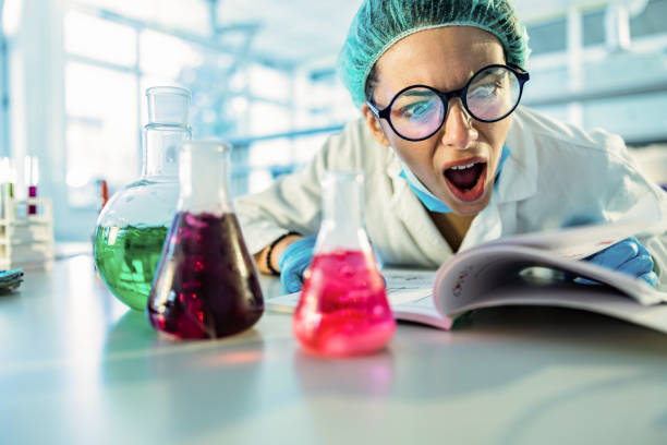 istock Crazy chemistry student working on chemical substances in laboratory. 1262841378