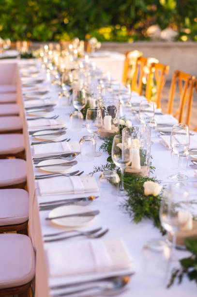 istock Table setting at a luxury wedding and Beautiful flowers on the table. 1262846716