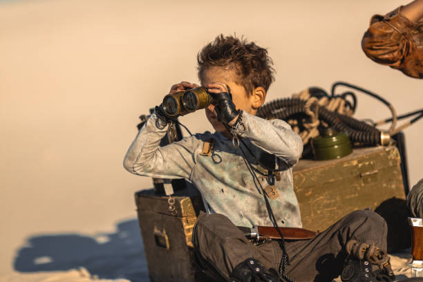 istock Post apocalyptic Warrior Boy Outdoors in a Wasteland 1262860571