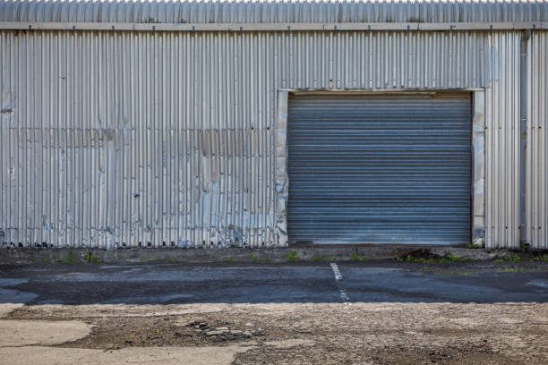 istock Gate and wall made of corrugated iron 1262862113