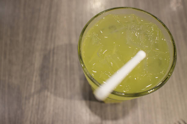 iced green tea on glass and wood table japanese style