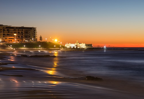 Sunrise across Newcastle Beach towards the famous Ocean Baths - Newcastle NSW Australia
