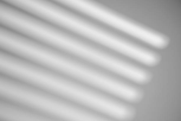 istock The shadow from the window on a white wall in sunny weather with bright light. Shadow overlay effect for photo. 1262875290