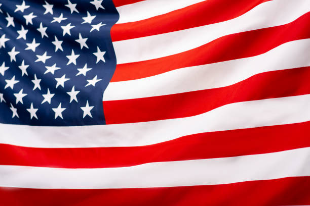 istock USA American flag background texture, elections, vote 1262878835