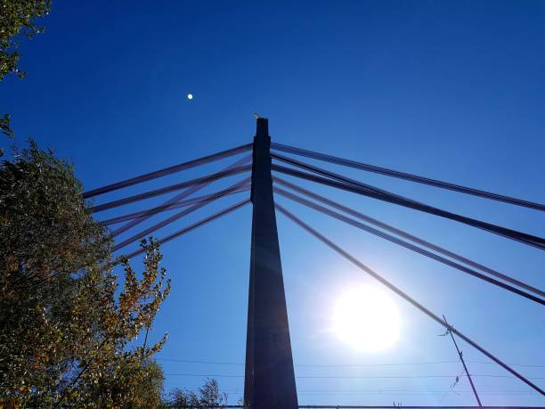 istock Bridge construction against the background of the sun 1262881605