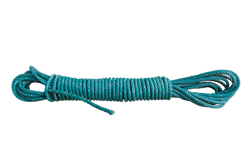Rolled green nylon rope on white background