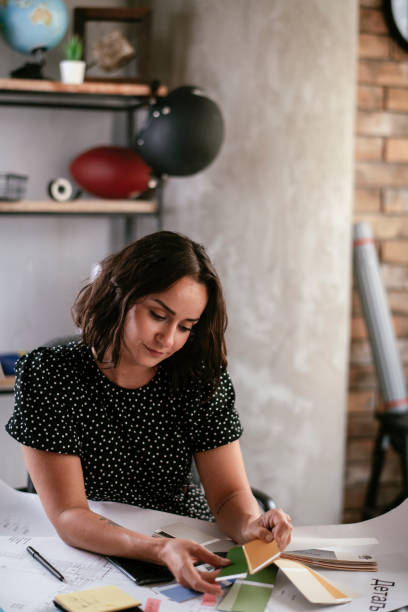 istock Beautiful businesswoman working on projects 1262881766