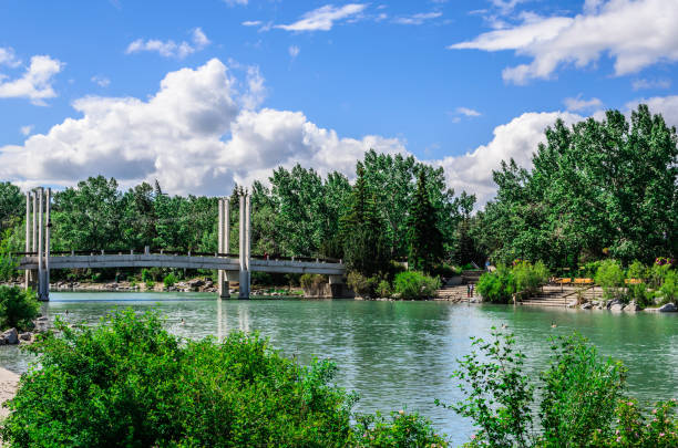 Bow River Pathway on a sunny blue sky and mixed clouds, Prince's Island Park, Calgary, Alberta, Canada