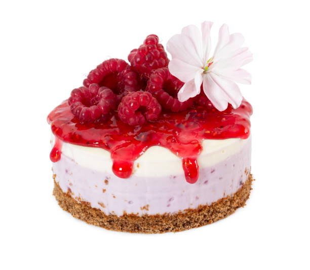 istock Cheesecake with fresh raspberries and jam isolated on white 1262883505