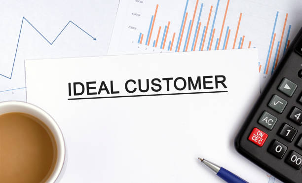 istock Ideal customer document with graphs, diagrams and calculator and a cup of fragrant coffee 1262889549
