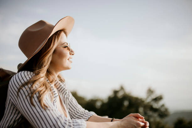 istock Young woman enjoys free time in nature 1262889708