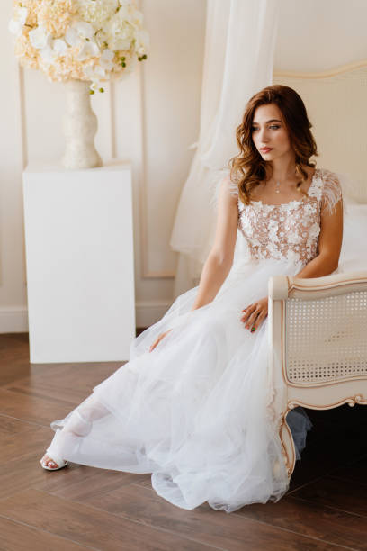 istock sad bride sitting on bed. morning before wedding. 1262898509